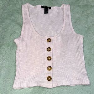 This is a size small. It’s a belly shirt. Cute to wear with a cardigan.
